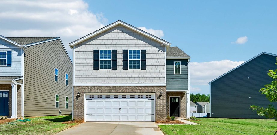 New construction 2-story home with shake siding, brick front and 2-car garage, 950 Two Brothers Lane, York SC (representative photo)